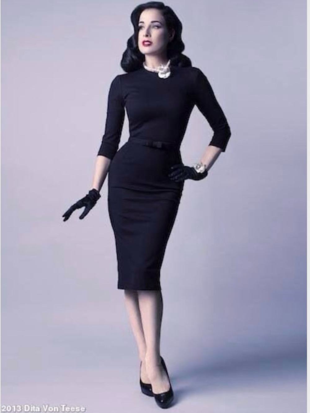 Dita Von Teese Classic Black Sheath Dress with Bow Belt.